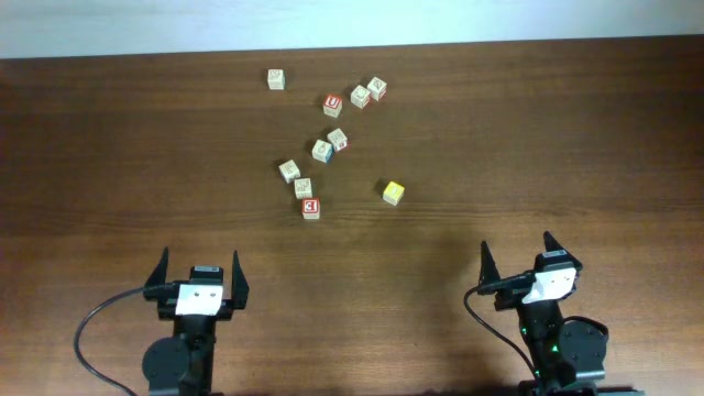 The row has been pushed apart and the arms have withdrawn.